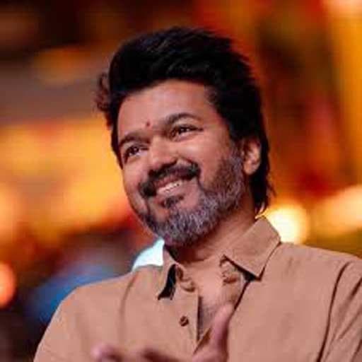 Thalapathy Vijay with fans cheering in background