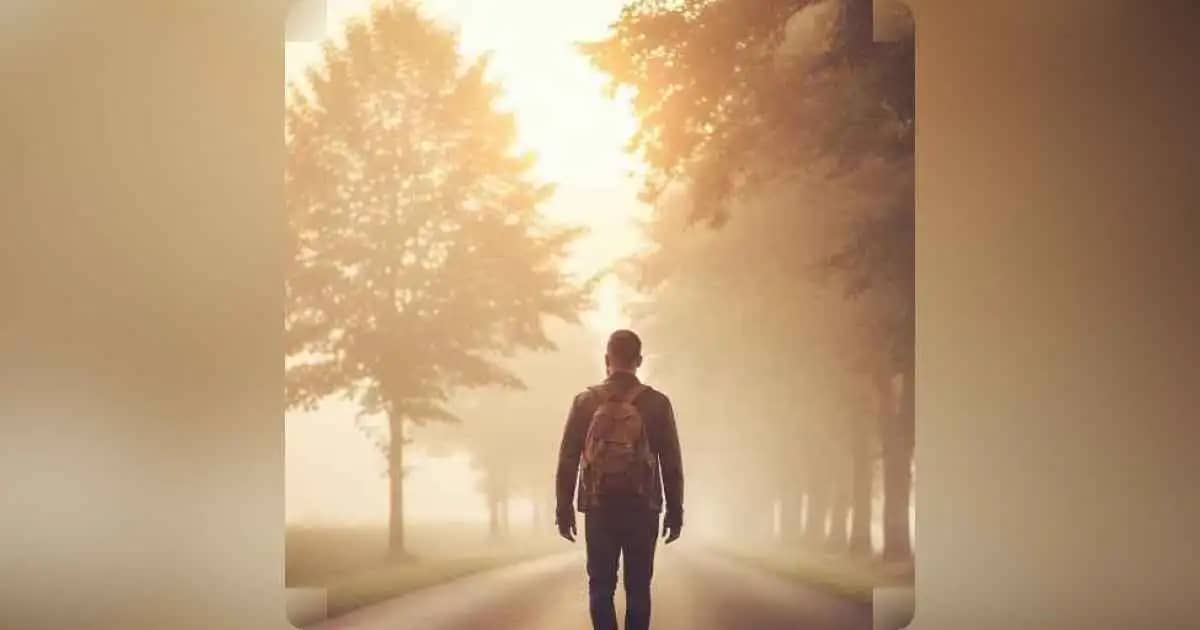 A solitary person walking down a quiet road at sunrise, symbolizing the lonely journey of personal growth