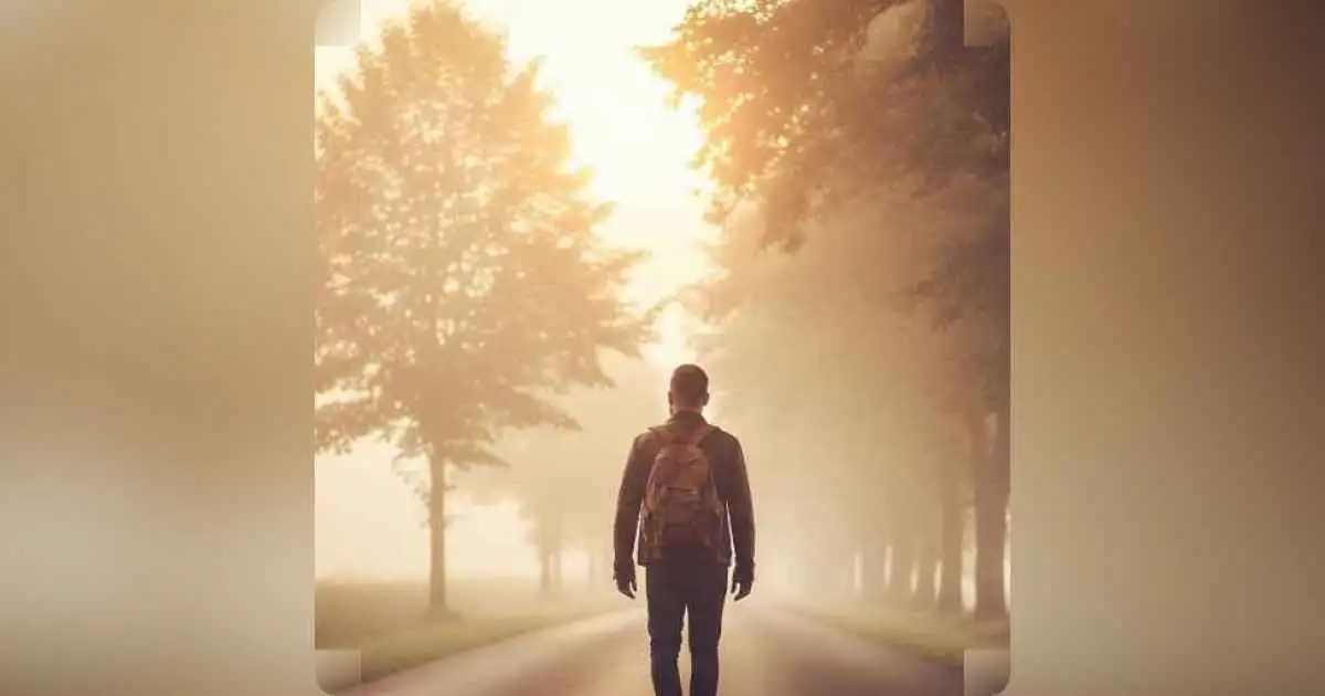 A solitary person walking down a quiet road at sunrise, symbolizing the lonely journey of personal growth