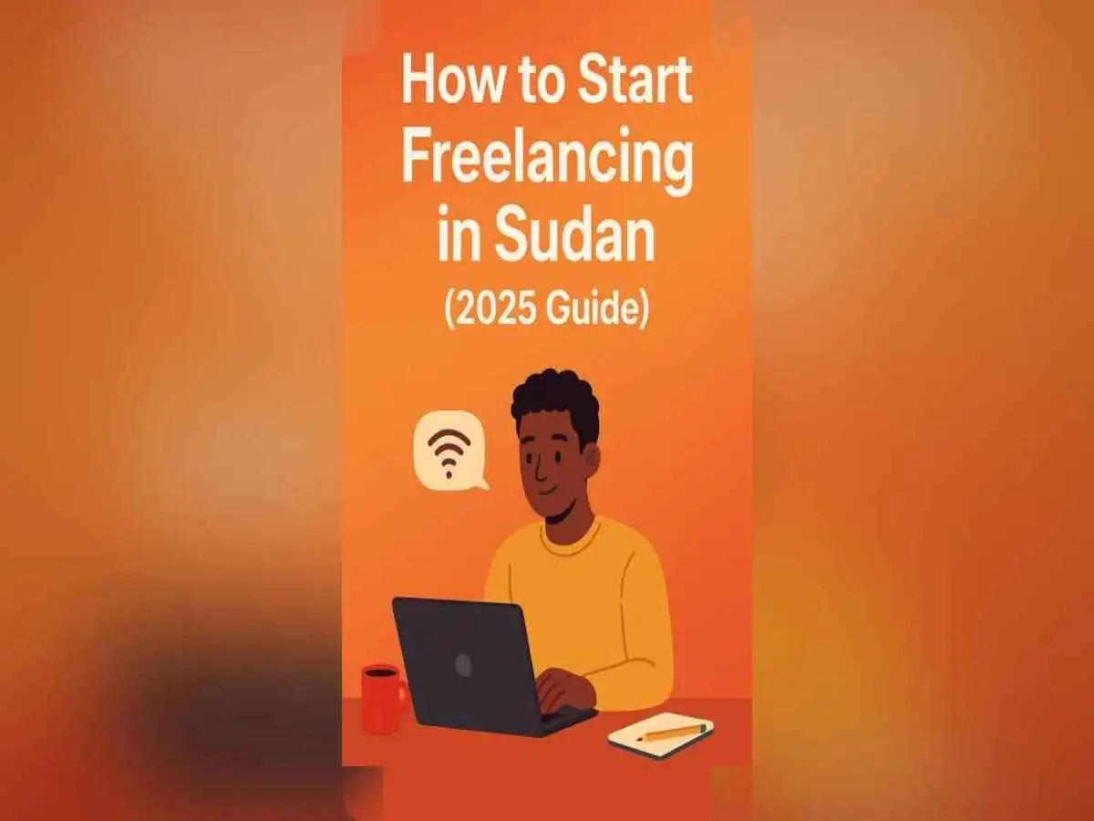 Sudanese freelancer working on a laptop with internet connection and creative tools