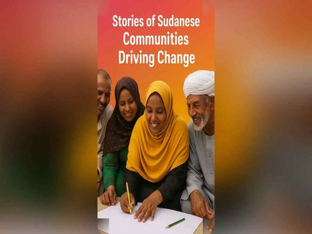 Sudanese community members collaborating outdoors, smiling and working on a local project.